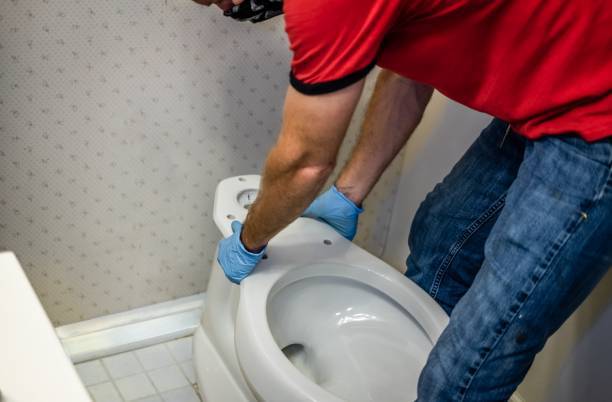 plombier installation WC raccordement 